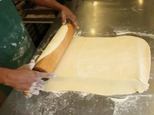 Rolling out homemade pie dough in the C&H kitchen
